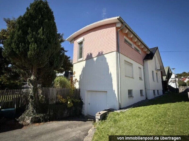 Foto 3 von 5 — Einfamilienhaus mit Doppelgarage, Carports und Anbau