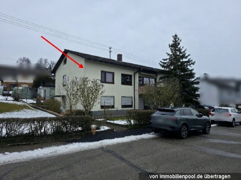 Foto 1 von 7 — zwei Wohnungen mit Garagen in einem Zweifamilienhaus