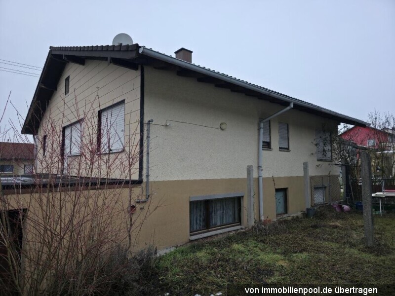 Foto 7 von 7 — zwei Wohnungen mit Garagen in einem Zweifamilienhaus