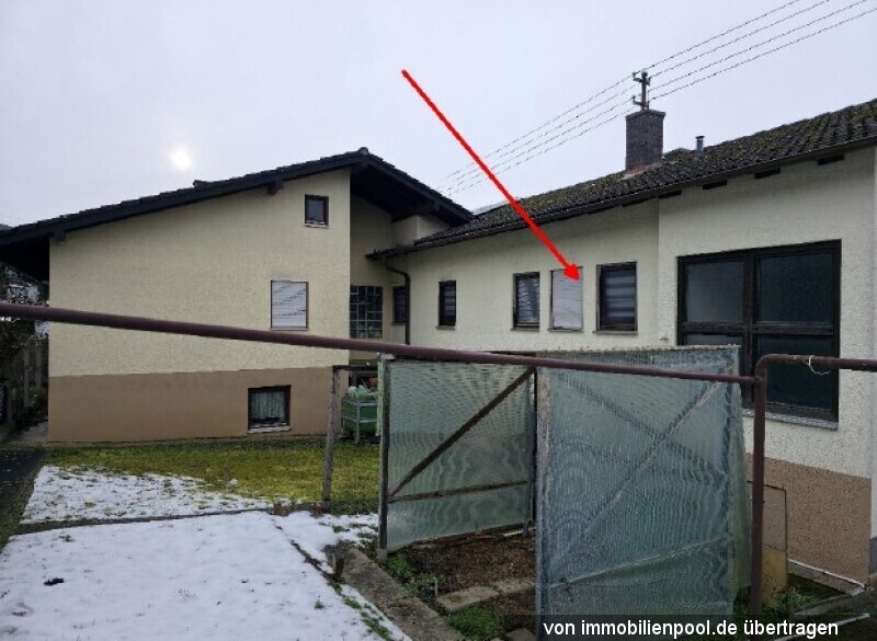 Foto 2 von 7 — zwei Wohnungen mit Garagen in einem Zweifamilienhaus