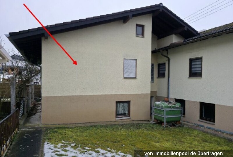 Foto 5 von 7 — zwei Wohnungen mit Garagen in einem Zweifamilienhaus