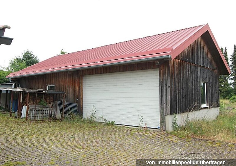Foto 4 von 6 — Wohnhaus mit Nebenräumen und Garage/Lagerhalle