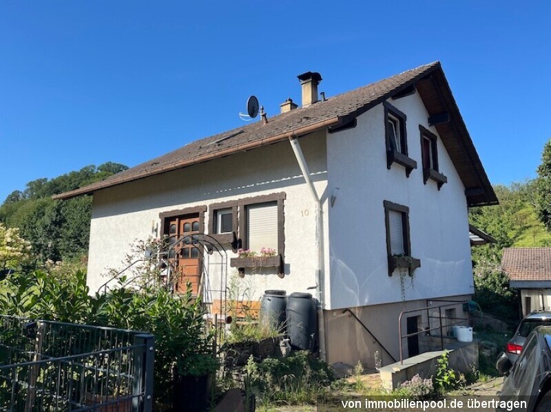 Foto 1 von 5 — Zweifamilienhaus mit mehreren Nebengebäuden