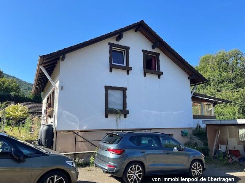 Foto 2 von 5 — Zweifamilienhaus mit mehreren Nebengebäuden