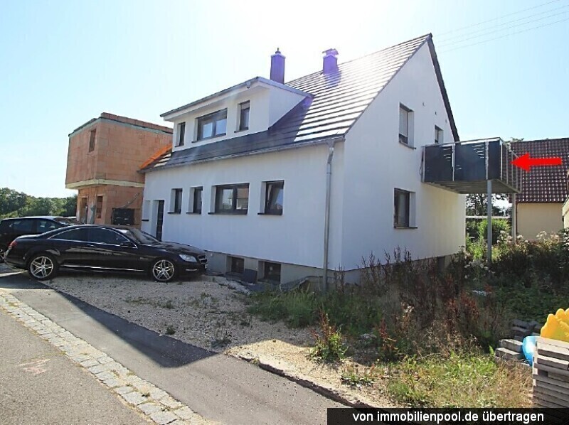 Foto 2 von 5 — 2-Familienhaus mit Einliegerwohnung und Flachdachanbau (Rohbau)