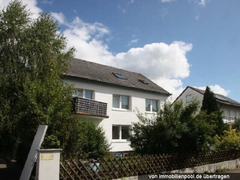 Foto 2 von 4 — Dreifamilienhaus mit Garage