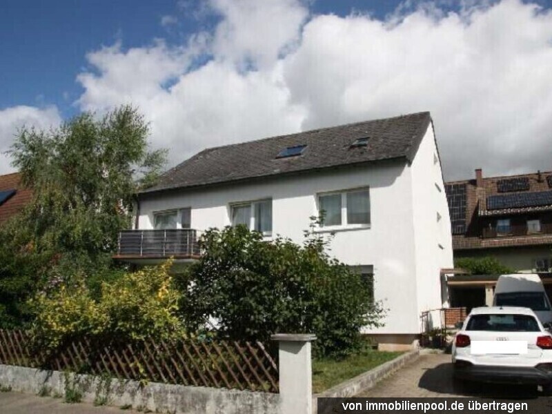 Foto 1 von 4 — Dreifamilienhaus mit Garage