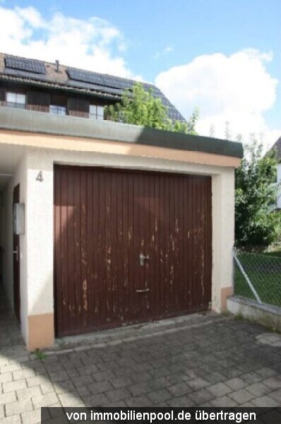 Foto 4 von 4 — Dreifamilienhaus mit Garage