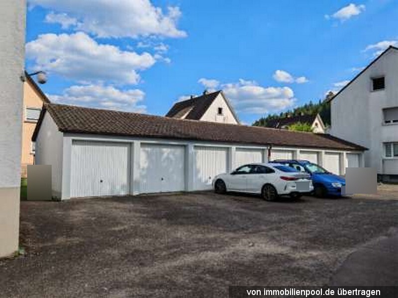 Foto 3 von 4 — zwei Mehrfamilienhäuser mit 10 Garagen