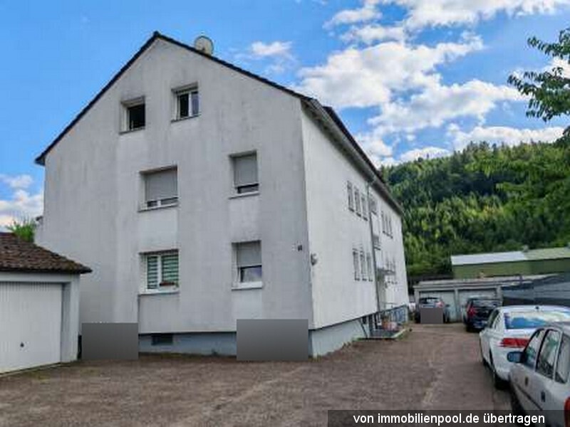 Foto 4 von 4 — zwei Mehrfamilienhäuser mit 10 Garagen