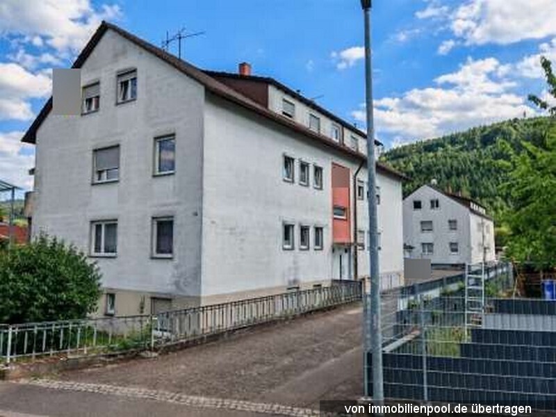 Foto 2 von 4 — zwei Mehrfamilienhäuser mit 10 Garagen