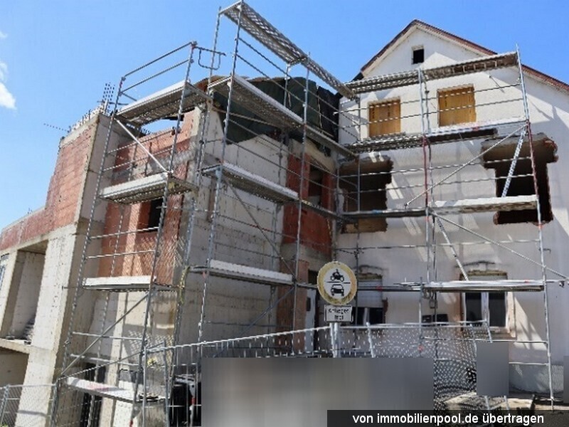 Foto 2 von 4 — Mehrfamilienhaus (Rohbau) mit kleiner Gewerbeeinheit