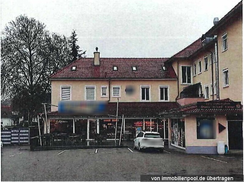 Foto 4 von 5 — Wohn- und Geschäftshaus mit Stellplätzen
