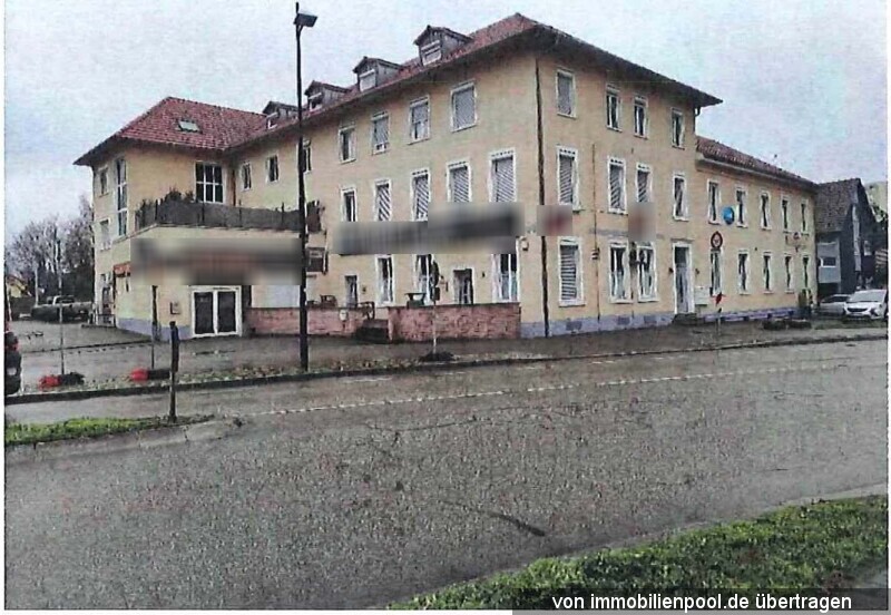 Foto 1 von 5 — Wohn- und Geschäftshaus mit Stellplätzen