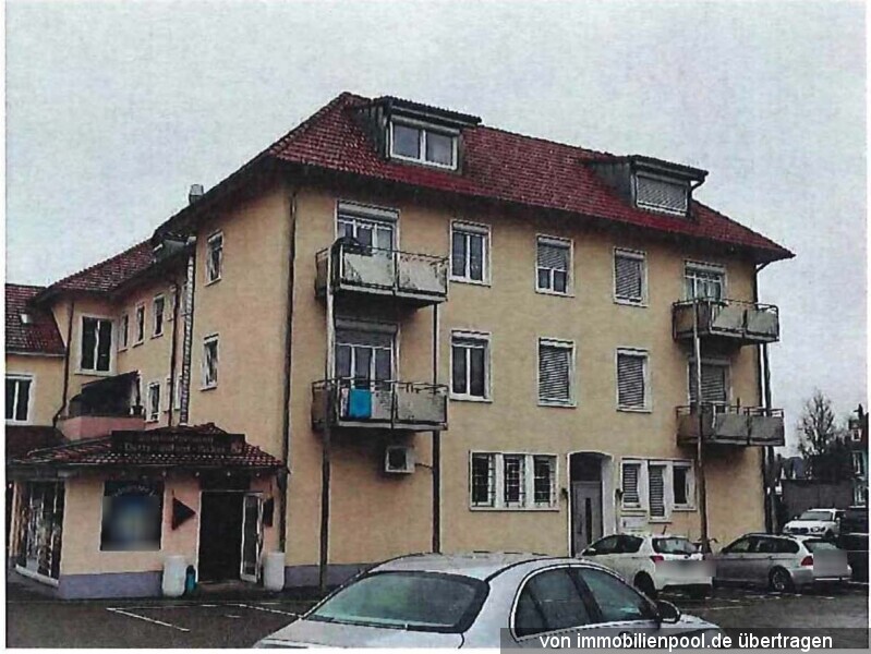 Foto 2 von 5 — Wohn- und Geschäftshaus mit Stellplätzen