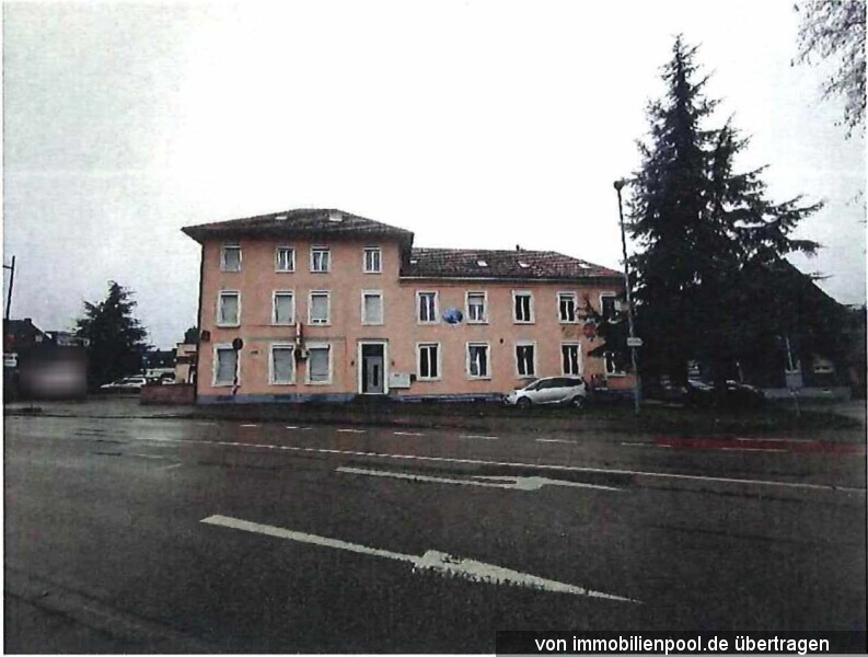 Foto 3 von 5 — Wohn- und Geschäftshaus mit Stellplätzen