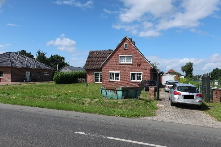 Foto 2 von 17 — Einfamilienhaus, Landwirtschaftsfläche und Waldfläche