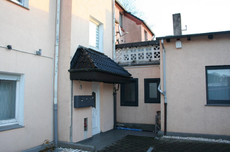 Foto 9 von 10 — Wohn-/Geschäftshaus, Gewerbeeinheit (z.B. Laden, Büro), Lagergebäude