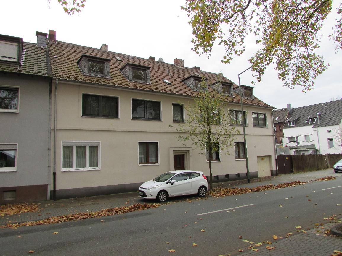 Foto 3 von 5 — Mehrfamilienhaus, Garage