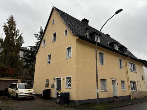 Foto 2 von 8 — Mehrfamilienhaus