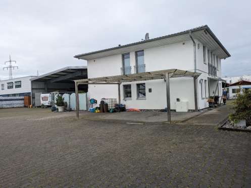 Foto 4 von 7 — Wohn-/Geschäftshaus