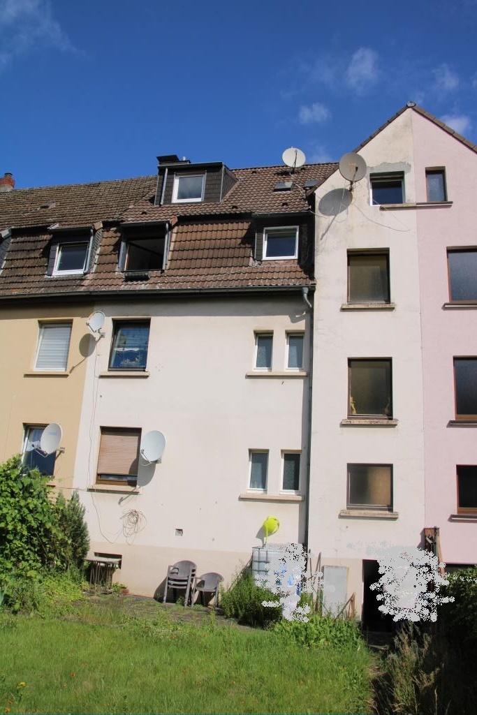 Foto 16 von 17 — Mehrfamilienhaus, Garage