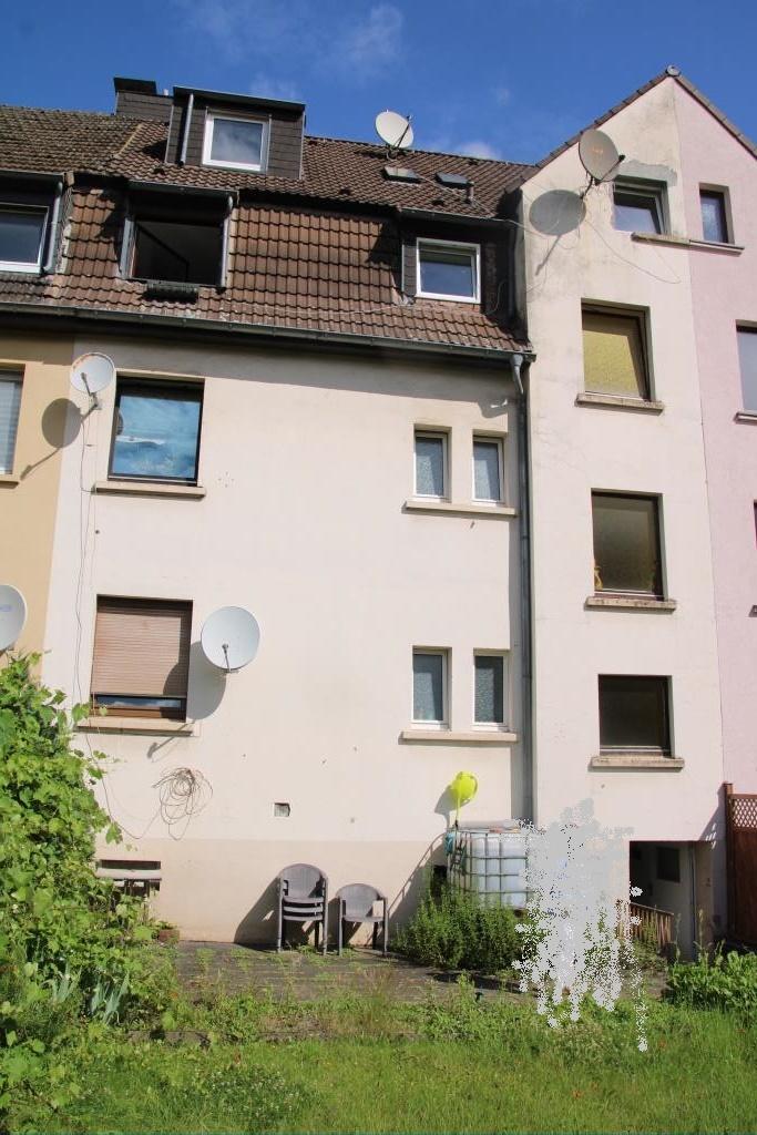 Foto 17 von 17 — Mehrfamilienhaus, Garage