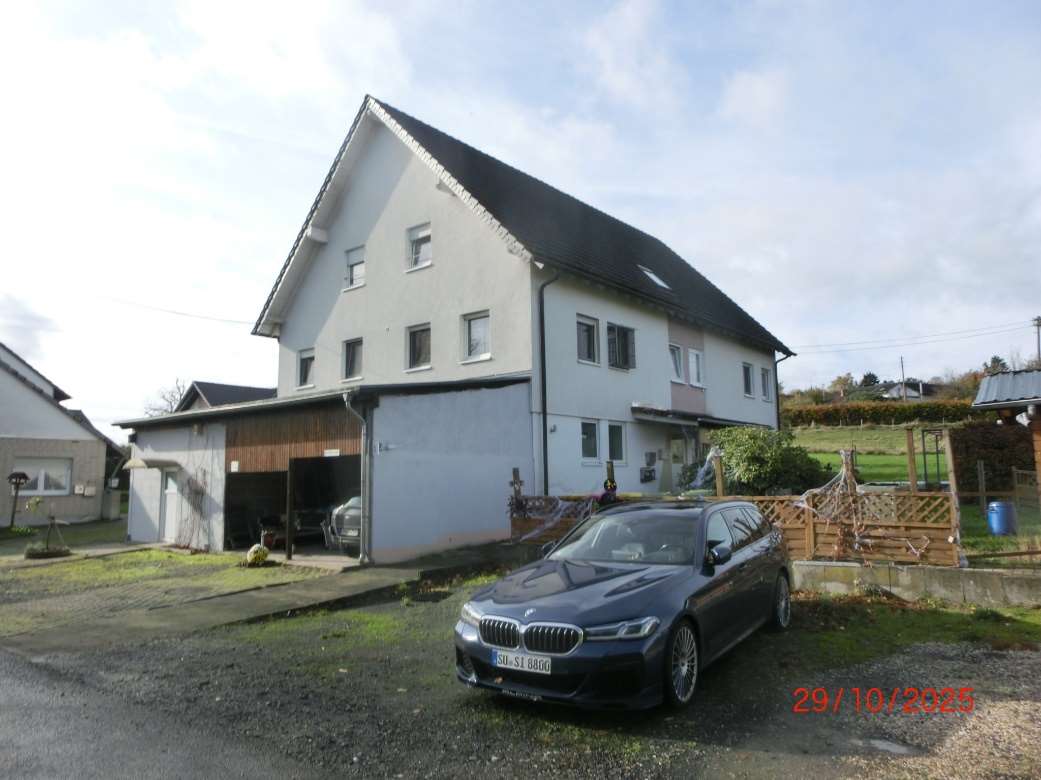 Foto 3 von 7 — Mehrfamilienhaus