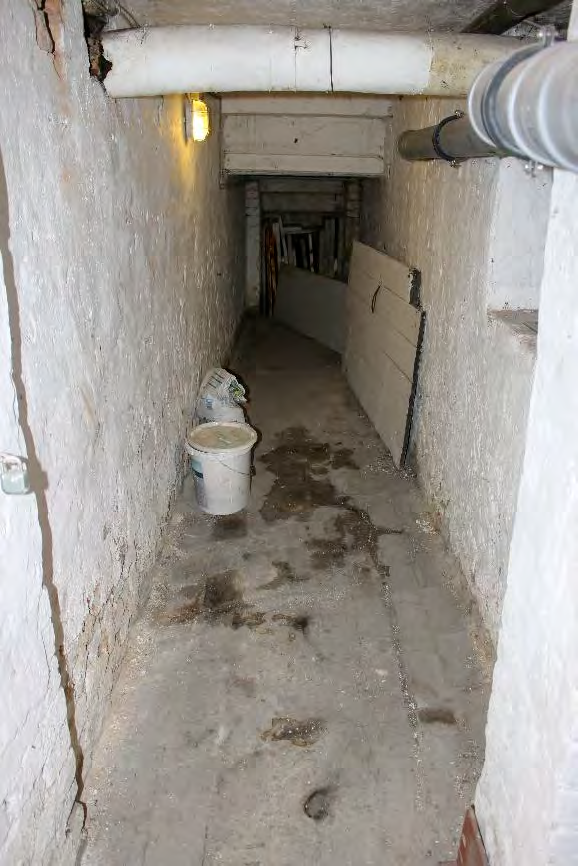 Foto 18 von 122 — Eigentumswohnung (1 bis 2 Zimmer), ETW Nr. 2 im EG: Diele, Schlafzimmer, Badezimmer, Wohnzimmer mit offenem Küchenbereich. Die ETW Nr. 2 ist zum Wertermittlungsstichtag vermietet.