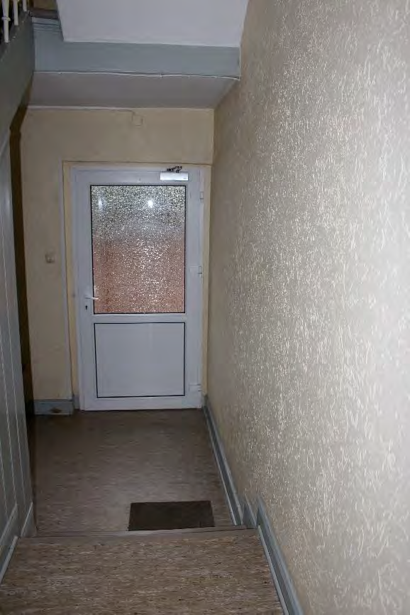 Foto 9 von 122 — Eigentumswohnung (1 bis 2 Zimmer), ETW Nr. 2 im EG: Diele, Schlafzimmer, Badezimmer, Wohnzimmer mit offenem Küchenbereich. Die ETW Nr. 2 ist zum Wertermittlungsstichtag vermietet.