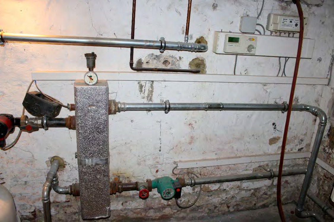 Foto 3 von 122 — Eigentumswohnung (1 bis 2 Zimmer), ETW Nr. 2 im EG: Diele, Schlafzimmer, Badezimmer, Wohnzimmer mit offenem Küchenbereich. Die ETW Nr. 2 ist zum Wertermittlungsstichtag vermietet.