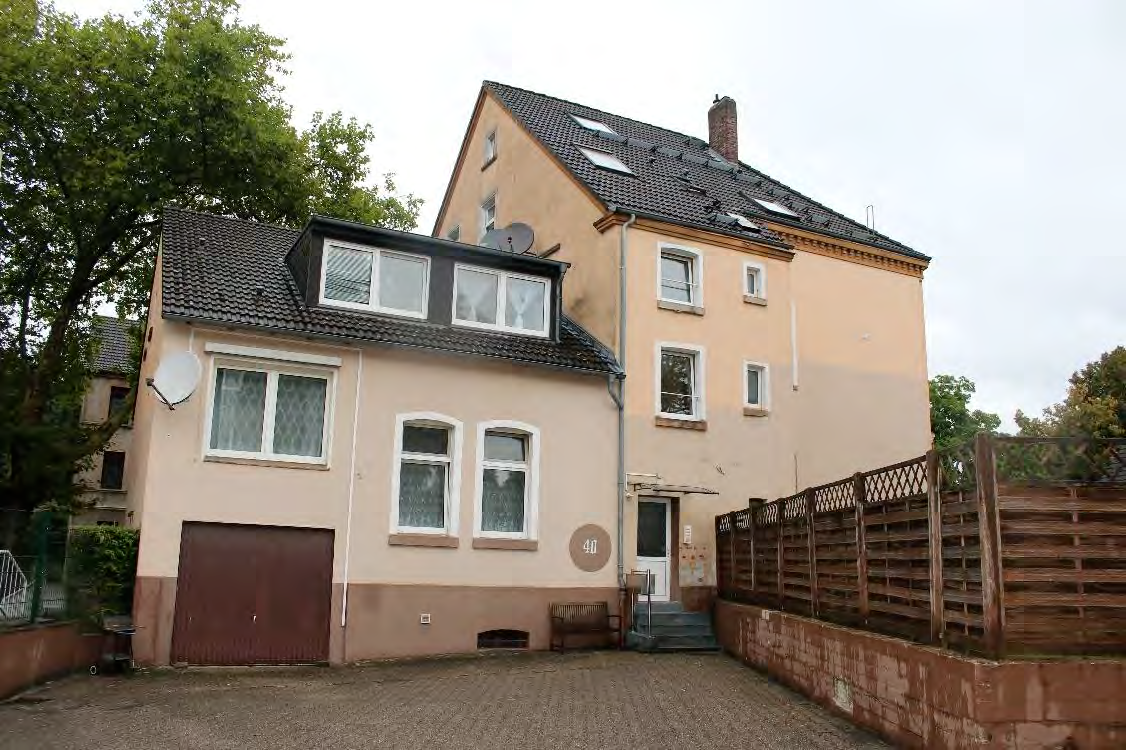 Foto 1 – Eigentumswohnung (1 bis 2 Zimmer), ETW Nr. 2 im EG: Diele, Schlafzimmer, Badezimmer, Wohnzimmer mit offenem Küchenbereich. Die ETW Nr. 2 ist zum Wertermittlungsstichtag vermietet.