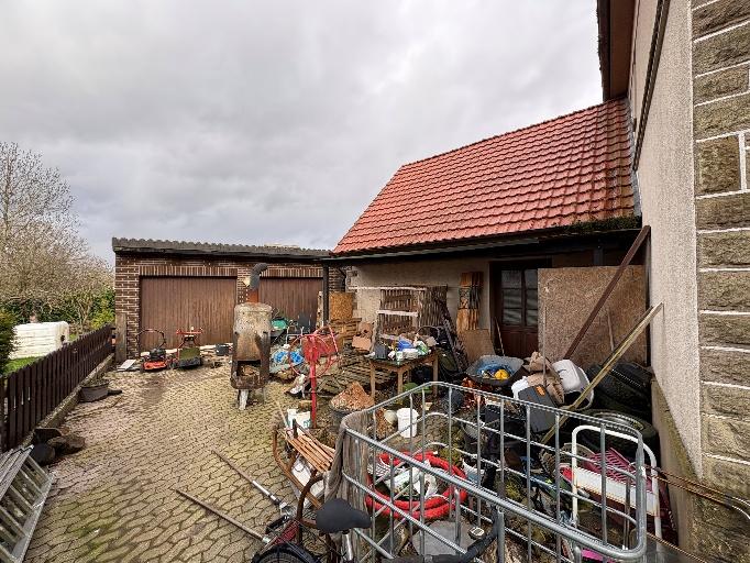 Foto 10 von 15 — Mehrfamilienhaus, Einfamilienhaus