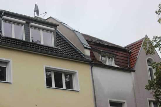 Foto 8 von 13 — Mehrfamilienhaus, Kfz-Stellplatz, unbebautes (Teil)Grundstück