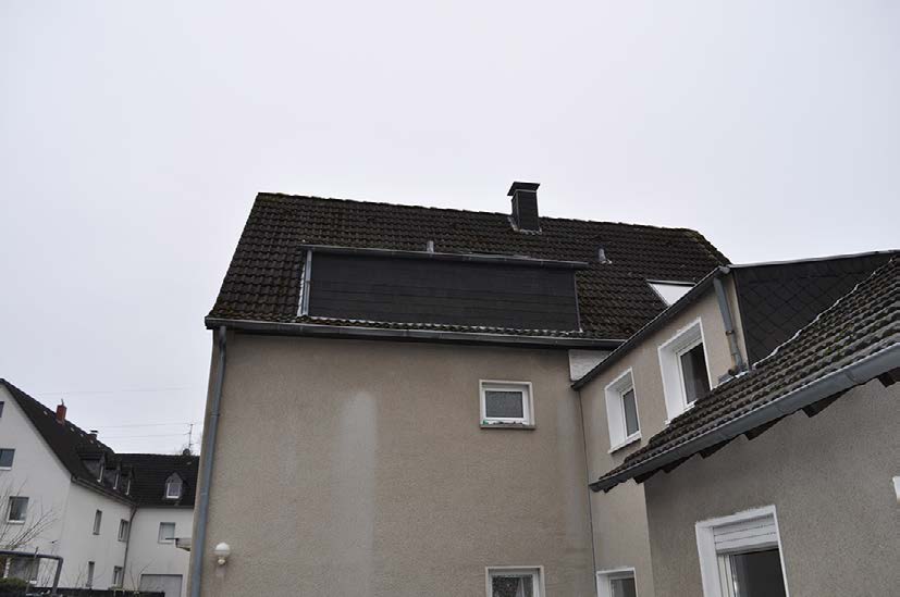 Foto 10 von 18 — Kfz-Stellplatz, Mehrfamilienhaus, 3 Garagen