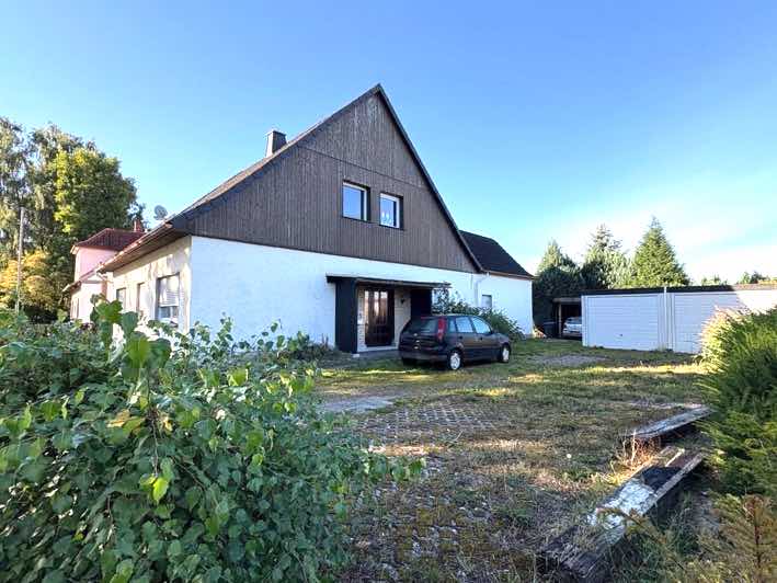Foto 3 von 7 — Zweifamilienhaus, Garage 2