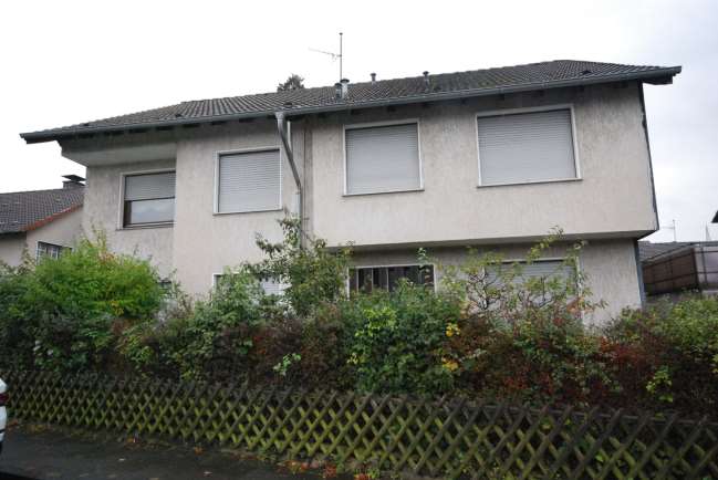 Foto 10 von 12 — Zweifamilienhaus, Garage, mit Einliegerappartement