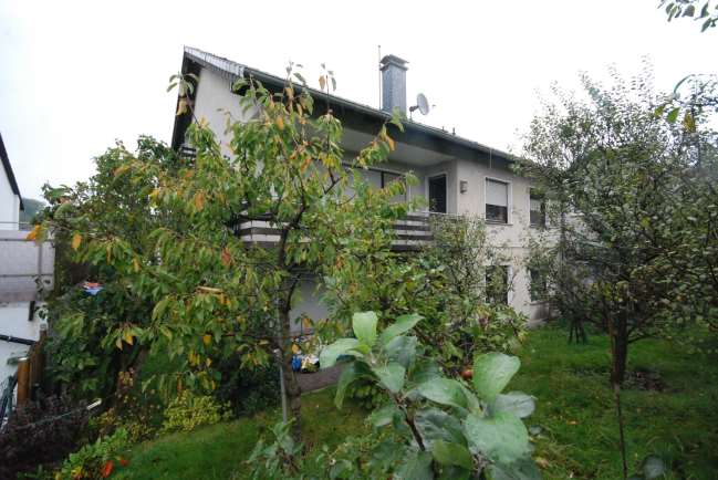 Foto 12 von 12 — Zweifamilienhaus, Garage, mit Einliegerappartement