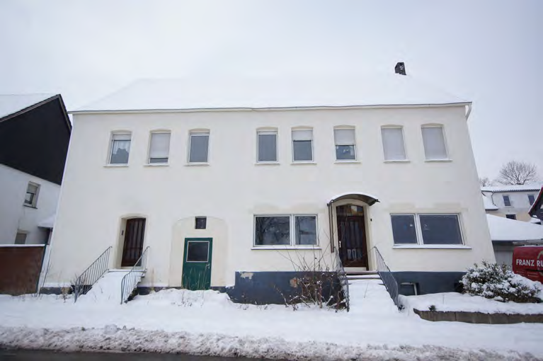 Foto 2 von 10 — Mehrfamilienhaus