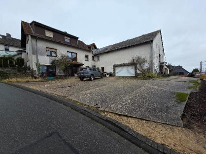 Foto 2 von 7 — Zweifamilienhaus, Garage, Eigentumswohnung (3 bis 4 Zimmer)