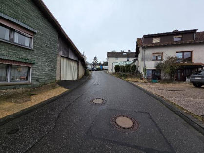 Foto 1 von 7 — Zweifamilienhaus, Garage, Eigentumswohnung (3 bis 4 Zimmer)