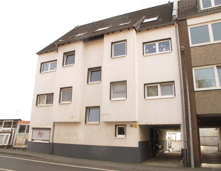 Foto 1 von 16 — Mehrfamilienhaus, mit Garagen