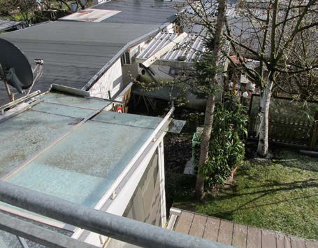 Foto 7 von 16 — Mehrfamilienhaus, mit Garagen