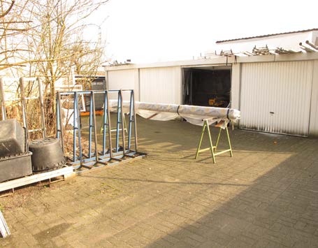 Foto 5 von 16 — Mehrfamilienhaus, mit Garagen
