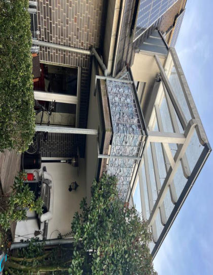Foto 17 von 22 — Zweifamilienhaus, Kfz-Stellplatz, Garage, Doppelhaushälfte, Carport nicht legitimiert