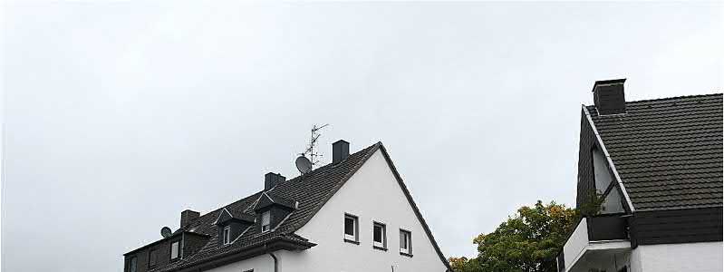 Foto 3 von 13 — Mehrfamilienhaus, Einfamilienhaus