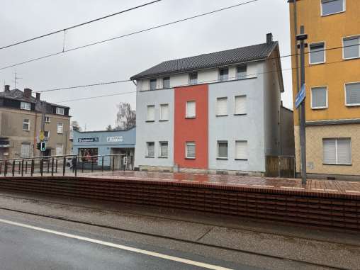 Foto 4 von 9 — unbebautes Grundstück, Garage, Gewerbeeinheit (z.B. Laden, Büro), Mehrfamilienhaus