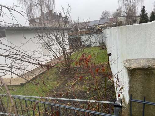 Foto 9 von 9 — unbebautes Grundstück, Garage, Gewerbeeinheit (z.B. Laden, Büro), Mehrfamilienhaus