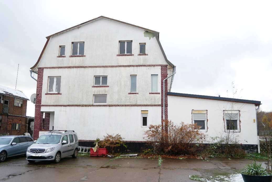 Foto 2 von 14 — Mehrfamilienhaus