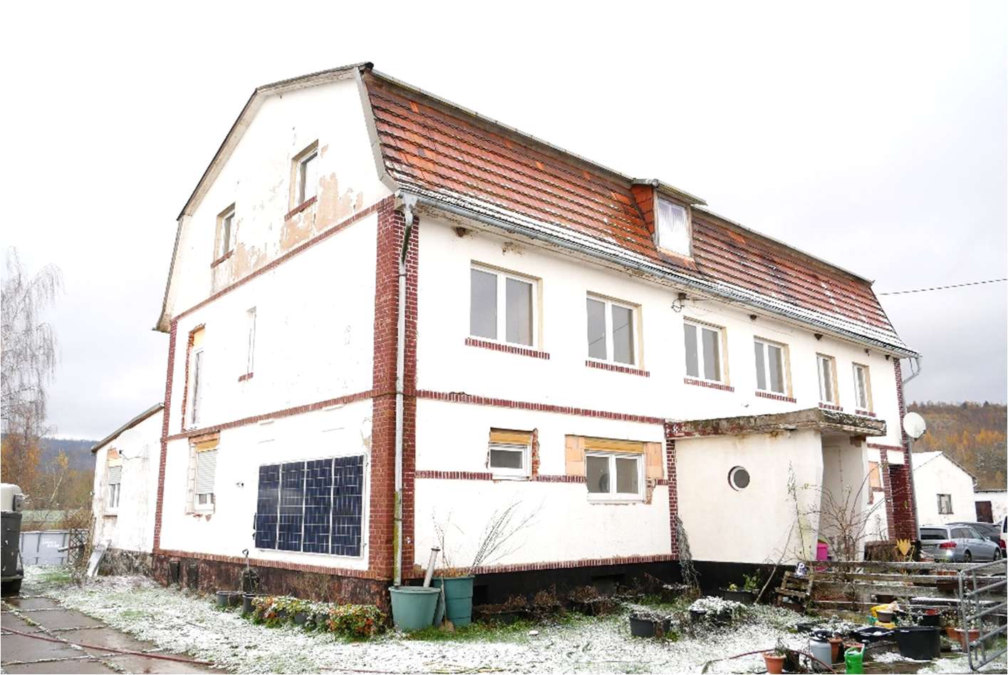 Foto 3 von 14 — Mehrfamilienhaus